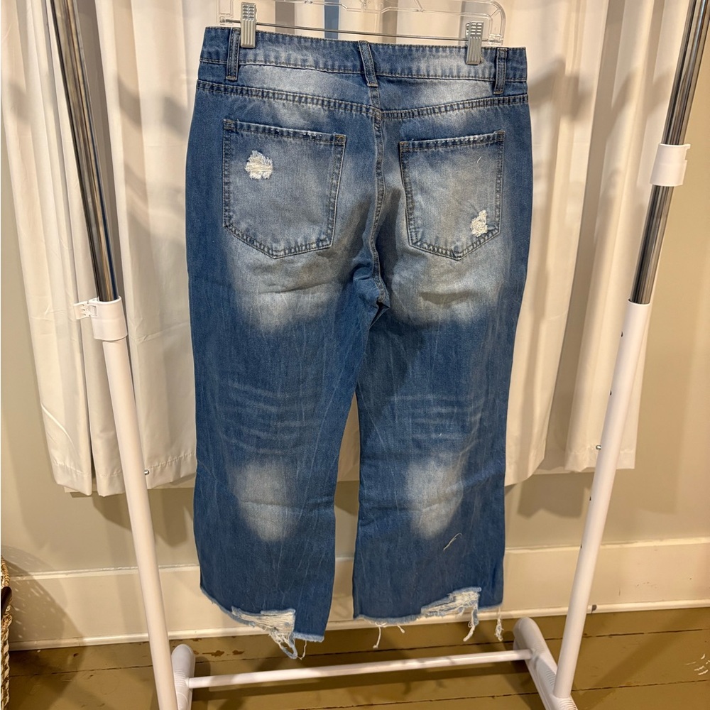 Women's Distressed Blue Jeans